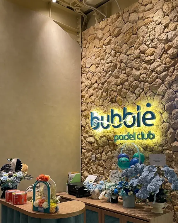 Stone wall and the Bubble pro shop corner